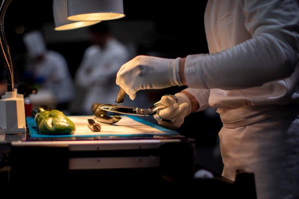 salon sirha lyon chef hands in kitchen